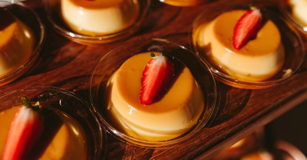 Enticing flan desserts topped with strawberries beautifully showcased on a wooden board.